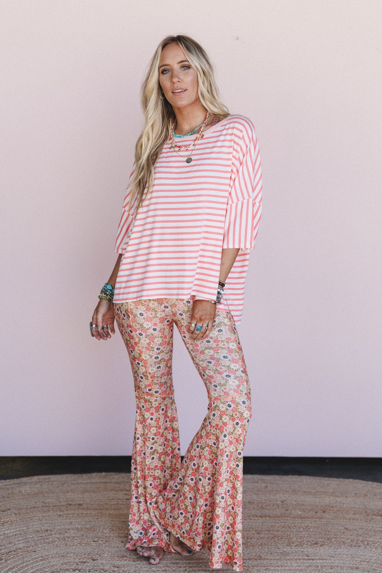 The Nest Dream in Flowers Flare Pants - Peach Coral